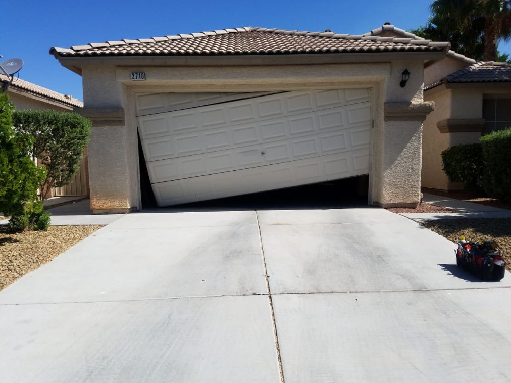 Garage Door Off Track Repair in Boulder City NV 1